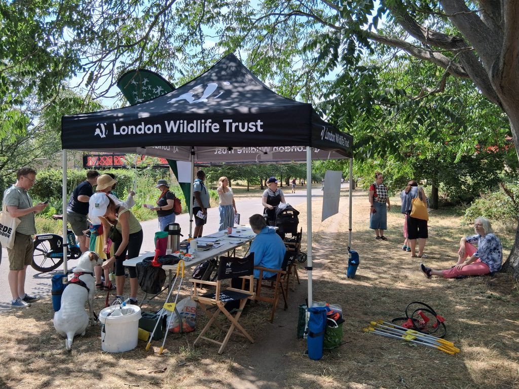 London Wildlife Trust gazebo with people gathered round at the start of the count.
