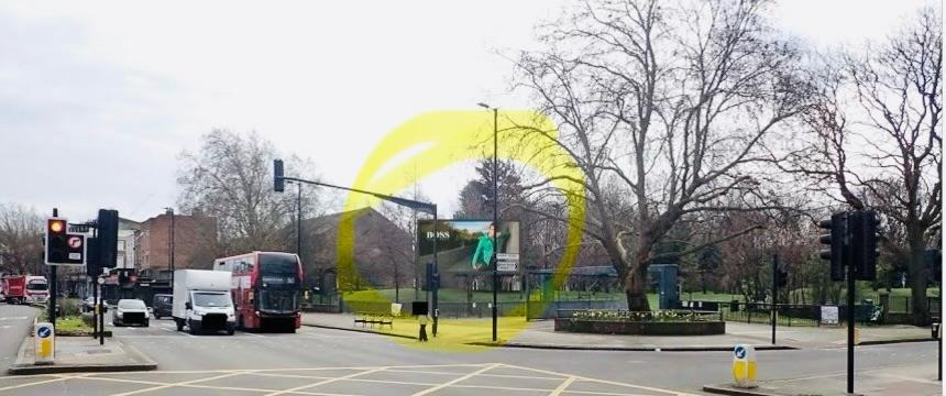Photo of the Old Kent Road Burgess Park entrance showing the digital screen above the entrance